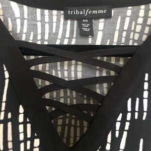 Black and white boutique dress with mock lace up. Size P/S. Hand wash cold.